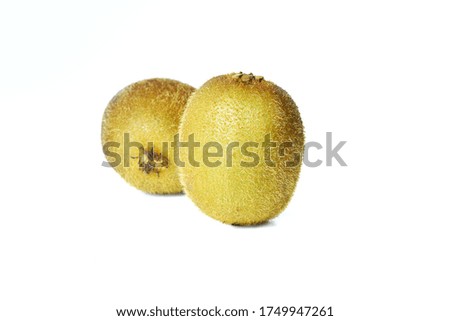 Golden Kiwi. Sour fruit on a white background.