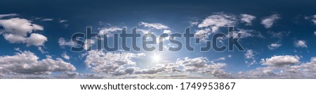 blue sky with beautiful fluffy cumulus clouds without ground. Seamless hdri panorama 360 degrees angle view without ground for use in 3d graphics or game development as sky dome or edit drone shot
