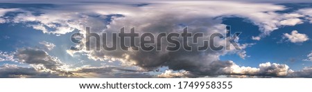 blue sky with beautiful dark clouds before storm. Seamless hdri panorama 360 degrees angle view with zenith for use in 3d graphics or game development as sky dome or edit drone shot