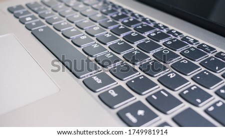 Notebook keyboard with nice light. Business concept. Work at home concept. Wifi. Laptop. 