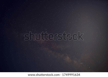Summer Milky Way and satellites in the night sky.