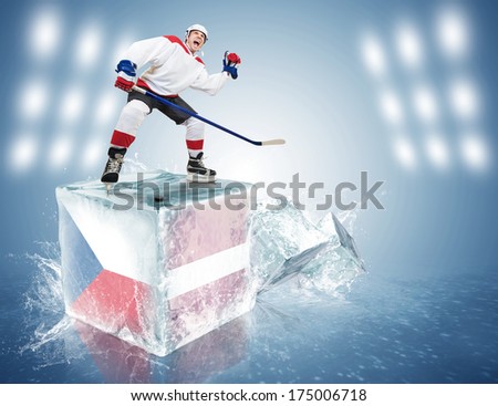 Czech Republic - Latvia game. Spunky hockey player on ice cube