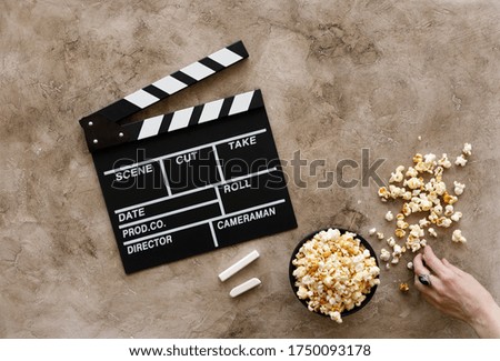 Filmmaking concept. Movie Clapperboard. Cinema begins with movie clappers. Top view. Copy space. Place for your text.