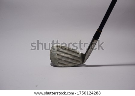 Golf club, close up of a golf drivers on white background