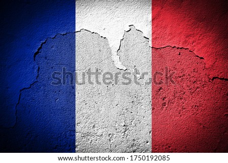 Mayotte flag painted on grungy cracked wall