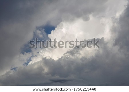 Sky covered with gray storm clouds, cumulonimbus.
