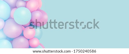 Colorful balloons background, punchy pastel colored and soft focus. pink and mint balloons photo wall birthday decoration. Copy space. Web banner. Wedding party. Royalty-Free Stock Photo #1750240586