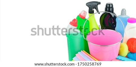Household chemicals, sponges, napkins bucket for cleaning isolated on white background. Free space for text. Wide photo
