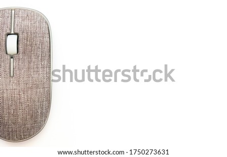 contemporary used material covered computer mouse in isolation on a white background