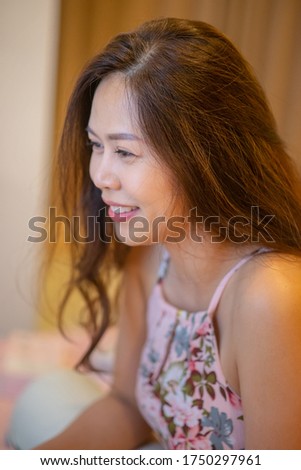 pink dress asian girl smiling