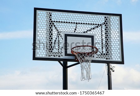 Outdoor basket goal of the day of the blue sky which it was fine                               