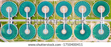 Tap water purification plant. Recirculation solid contact Clarifier sedimentation tank of Water treatment plant Royalty-Free Stock Photo #1750400411