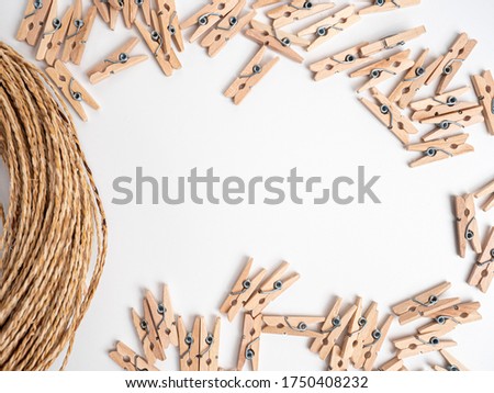 Wooden clip isolated on background.
