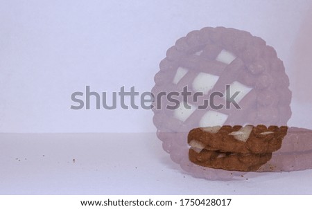 Chocolate cokie with white vanila creme, ghosty picture
