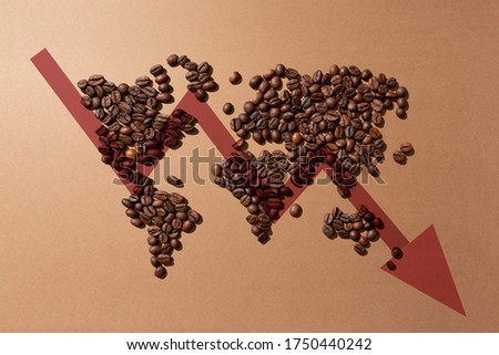 value of coffee in the markets worldwide.World map made with coffee beans on brown background