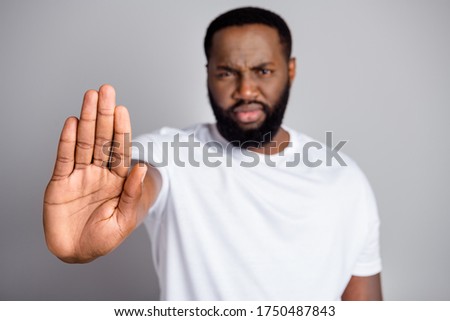 Photo of disappointed dark skin african protester member community against black citizens lawlessness raise arm stop murder people disenfranchised concept isolated grey color background
