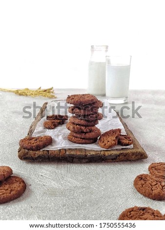 Cookies are baked foods that are small, flat, and sweet. Made from flour, sugar and some types of oil or fat. Cookies can also be mixed with other ingredients such as raisins, oats, chocolate chips.