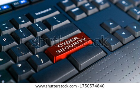 Red button keyboard with CYBER SECURITY text
