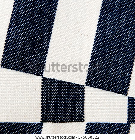 Lapped navy blue striped canvas closeup.