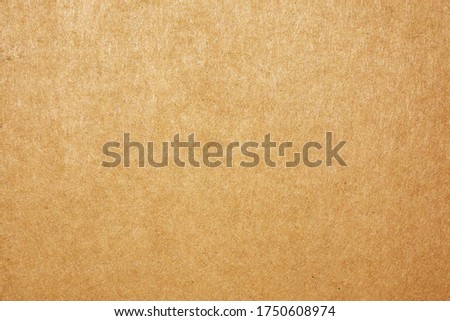 The surface of a brown cardboard for the background