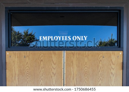 Employees Only Sign on Door