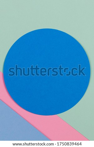 Abstract colored paper texture background. Geometric shapes and lines in blue, light green, yellow, pastel pink colours