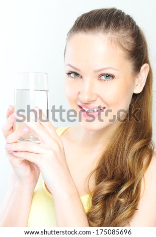 picture of beautiful woman with glass of water .