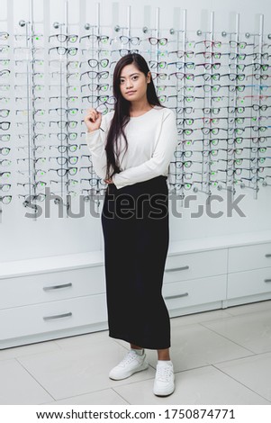 Young asian girl with glasses in clinic