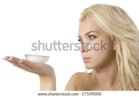 lady holding candlestick holder on isolated studio picture