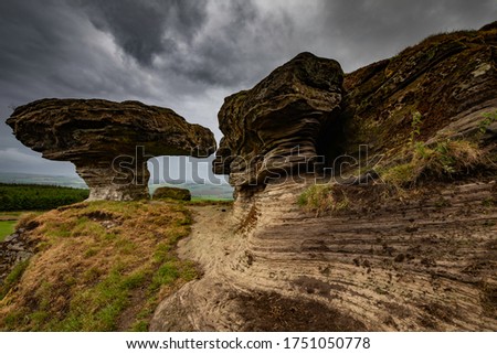 mushroom like rock formation called the Bonnet stane, located in Lomond hills, Fife, Scotland, Uk.