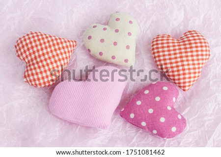 Valentine's day celebration concept. Heart on textured paper background. Festive background for Valentine's Day. Place for text.
