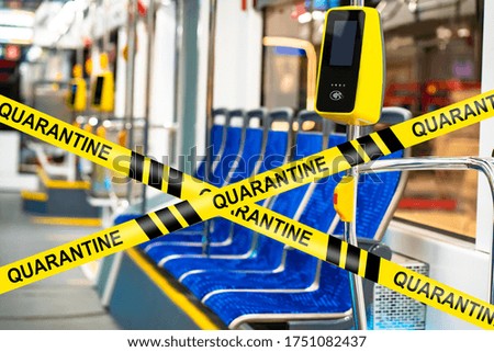 Quarantine ribbon in a subway car. Empty tram due to quarantine. Concept - the passage is blocked due to the threat of infection. Closing the metro in connection with a pandemic. Empty bus.