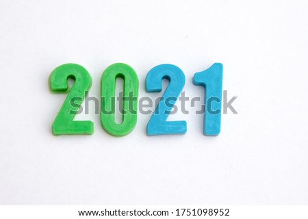 Numerals 2021 made of colorful toy plastick bricks. New year concept. Vision of new twenty twenty one logo Plastic numbers 2021 but white background. New Year 2021. Results of 2021. Concept