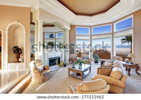 Amazing luxury interior with stunning window view on mountains