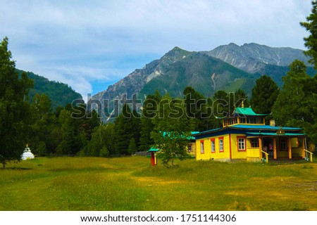 The Buddhist datsan in the city of Arshan. The stupa is visible on the left. Royalty-Free Stock Photo #1751144306