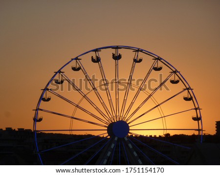 Ferris Wheel Sunset Antibes South of France with Silhouettes of People