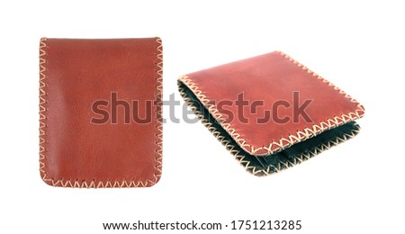 Hand made leather whit seam wallet isolated on white background with clipping path included.