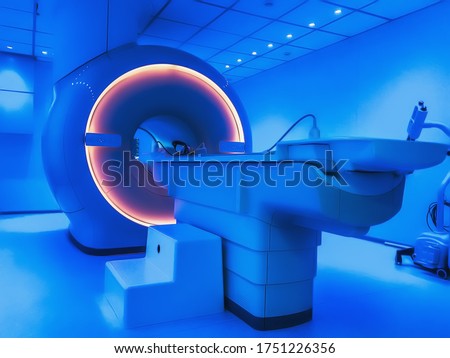 MRI - Magnetic resonance tomography imaging scan device in blue color. Royalty-Free Stock Photo #1751226356