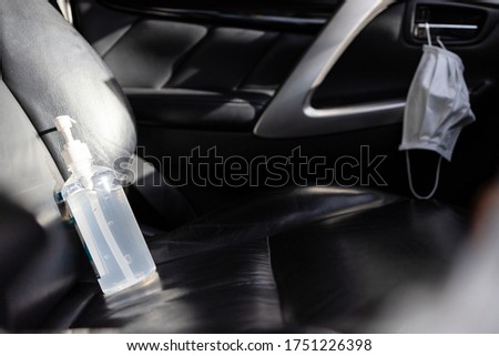 Hand sanitizer placed on car seat and exposed to sun for a long time in sunny very hot day,Do not keep alcohol antiseptic gel in the car,dangerous flammable objects can cause a fire inside the car
 Royalty-Free Stock Photo #1751226398