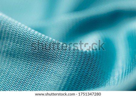 Blue fabric as an abstract background. Texture