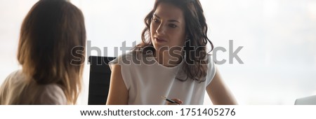 Businesswomen negotiating, client company representative communication, recruiter listen applicant candidate during job interview lead by HR manager. Horizontal photo banner for website header design