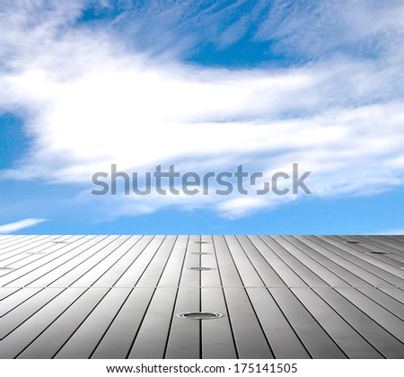 silver metal on the background of blue sky