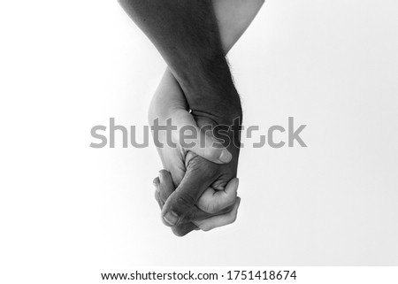 Anti racism and black lives matter. White, black couple holding hands. Royalty-Free Stock Photo #1751418674