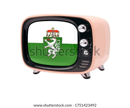The retro old TV is isolated against a white background with the flag of Styria