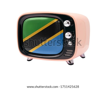 The retro old TV is isolated against a white background with the flag of Tanzania