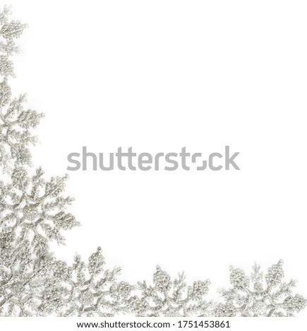 Silver Christmas snowflake frame. Beautiful snowflake on white background. Winter holidays concept