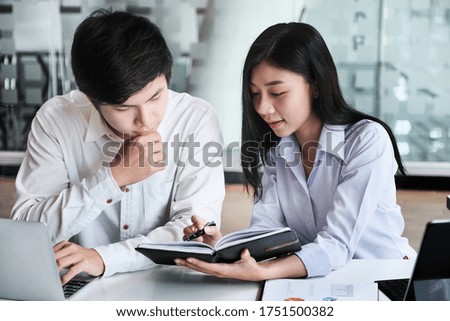 Consultation or Market data research concept, Adjustment of marketing strategies Female company owner discussing to a male market analyst To consult the company's marketing strategy.