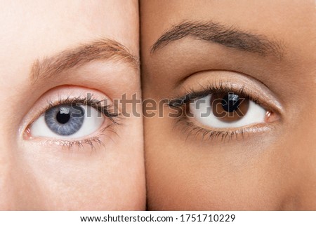 Portrait of attractive women with blue and brown eyes  Royalty-Free Stock Photo #1751710229