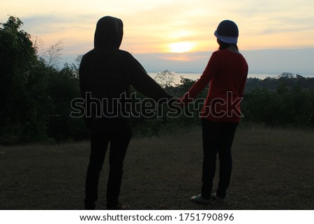 Watching the sunset with lovers at Srinakarin dam Thailand