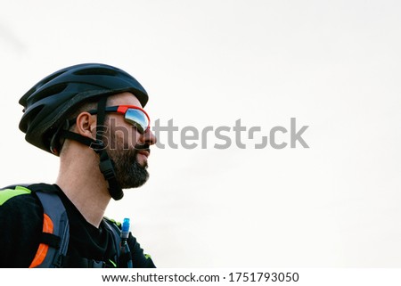 portrait of a male cyclist isolated from the background